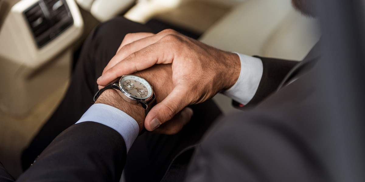 Man Looking at His Watch